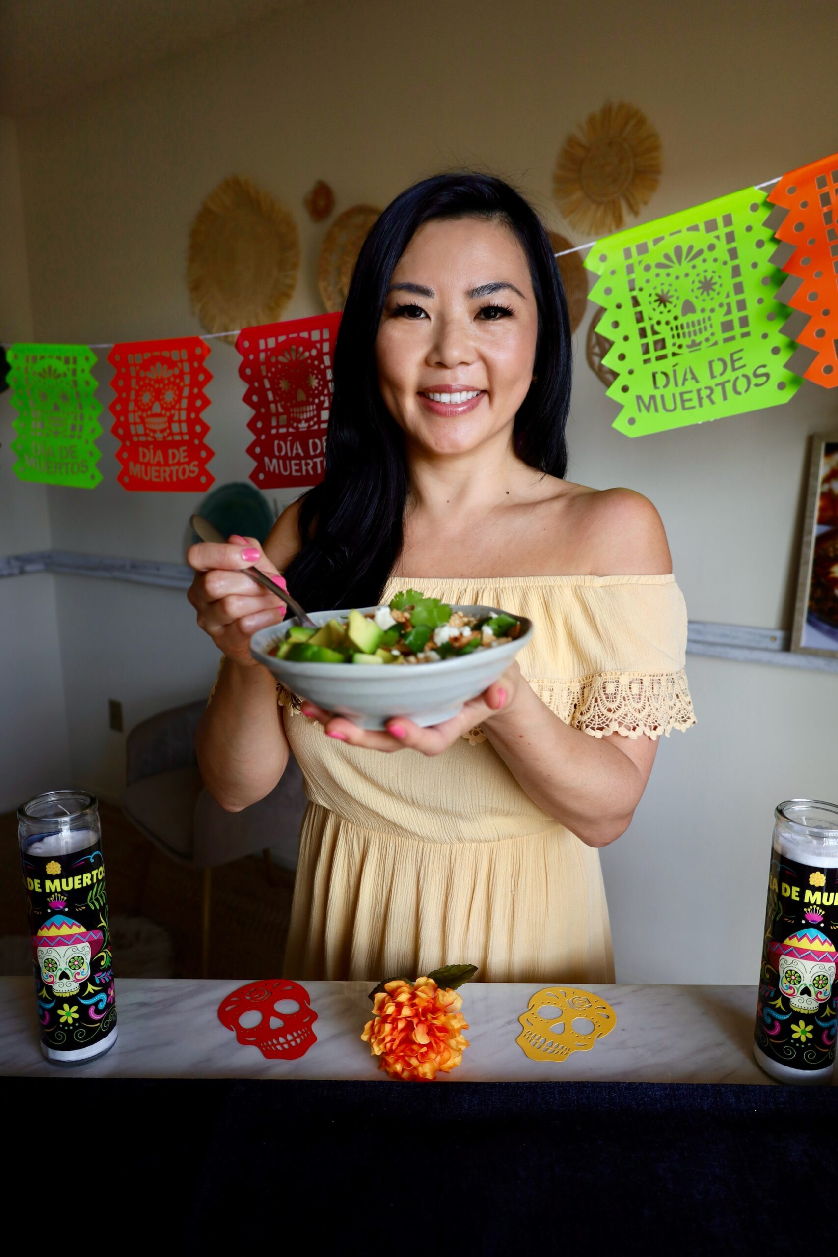Travel and Food Blogger Tinger Hseih holding her healthy chicken tortilla soup